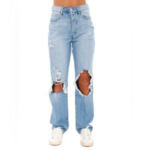 Boyfriend jeans straight fit distressed size 5 light wash.